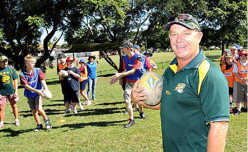 PARTICIPATION: Australian Rugby League coach Steve Belsham puts Gympie Special School students Jessie Harris and Nick Russell through their paces yesterday. Players are practising ahead of a carnival in Nambour later this month. PARTICIPATION: Australian Rugby League coach Steve Belsham puts Gympie Special School students Jessie Harris and Nick Russell through their paces yesterday. Players are practising ahead of a carnival in Nambour later this month.